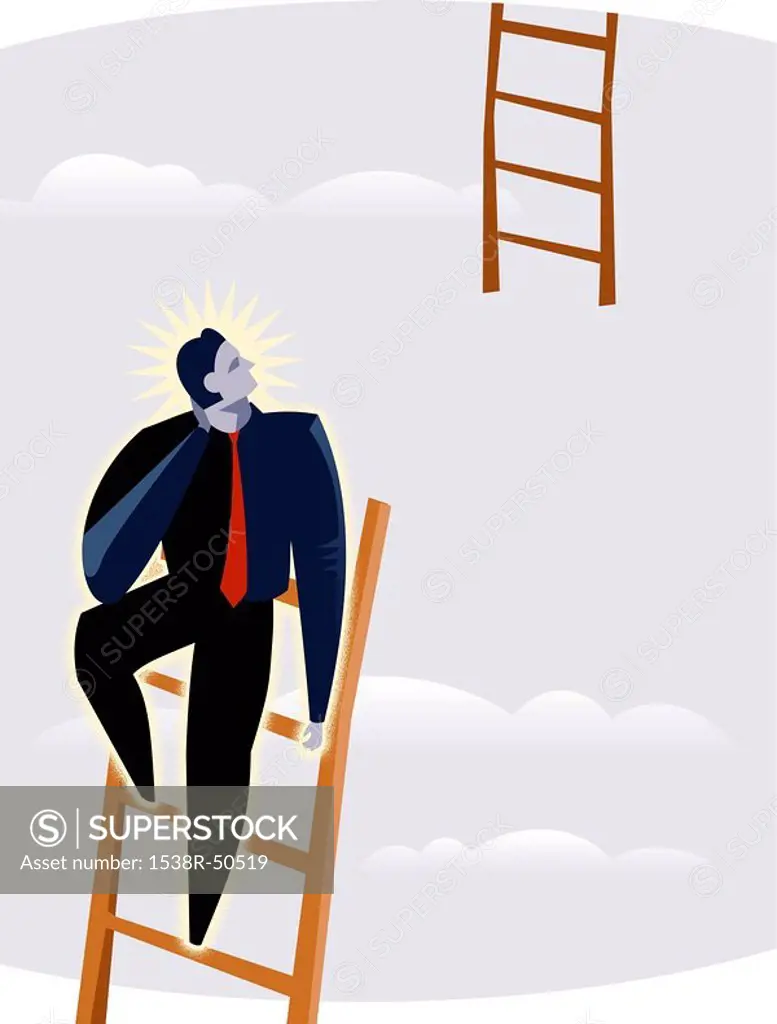 A man at the top of a ladder
