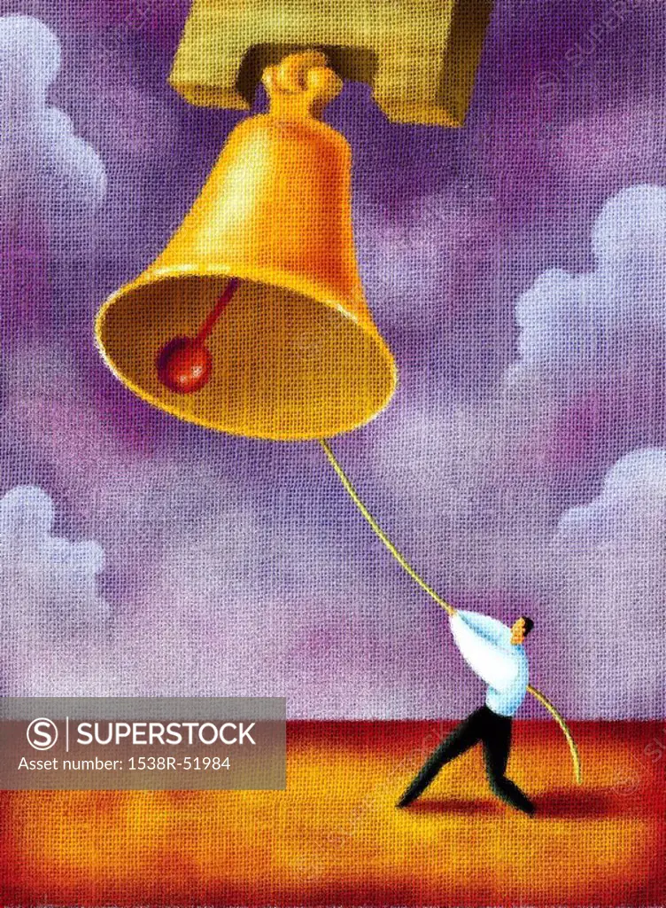 A businessman ringing a large bell