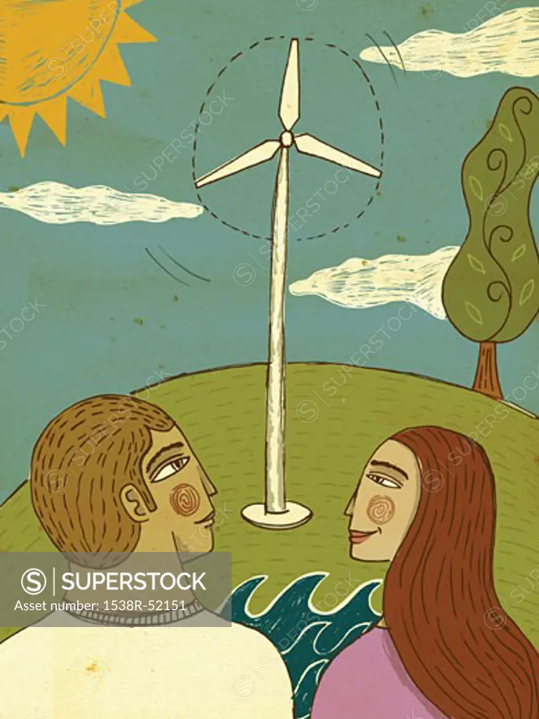 Two people looking at a wind turbine on a sunny day