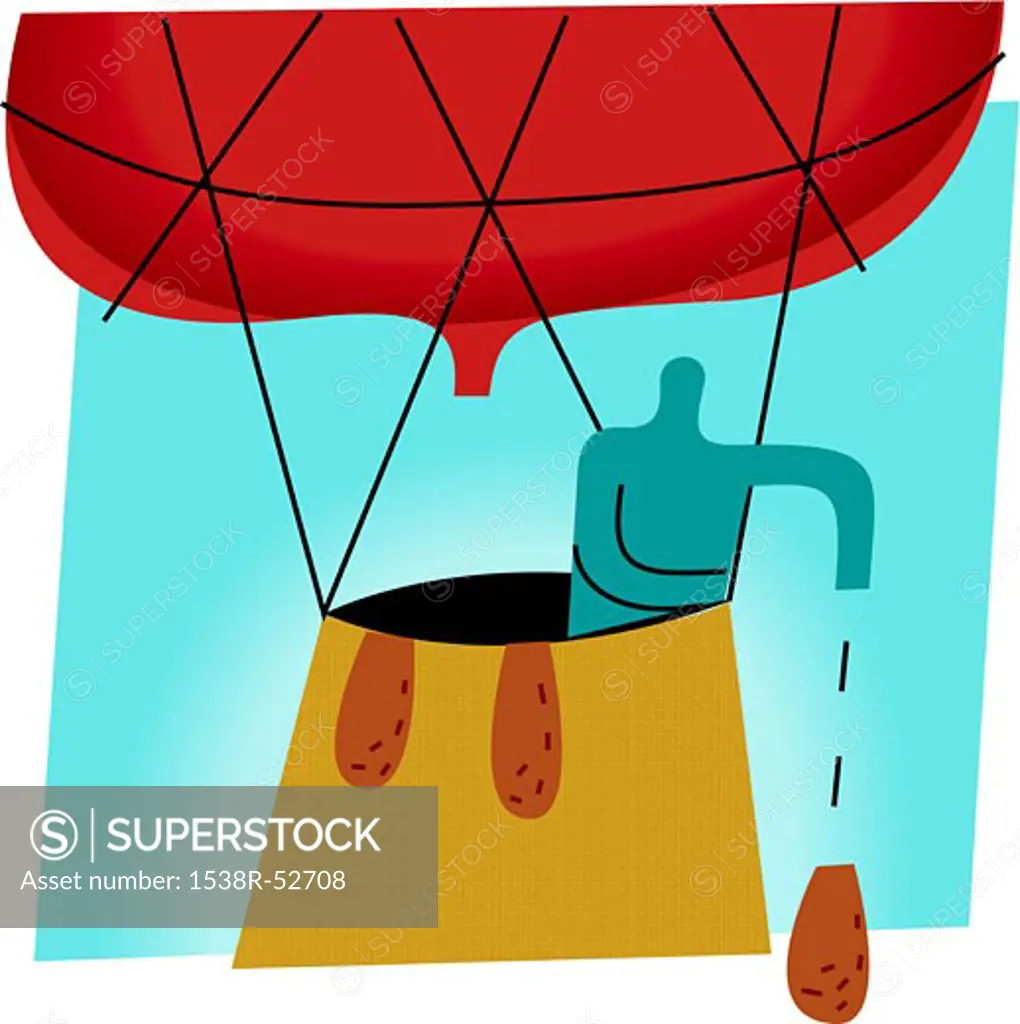 Silhouette of a man dropping a weight from a hot air balloon