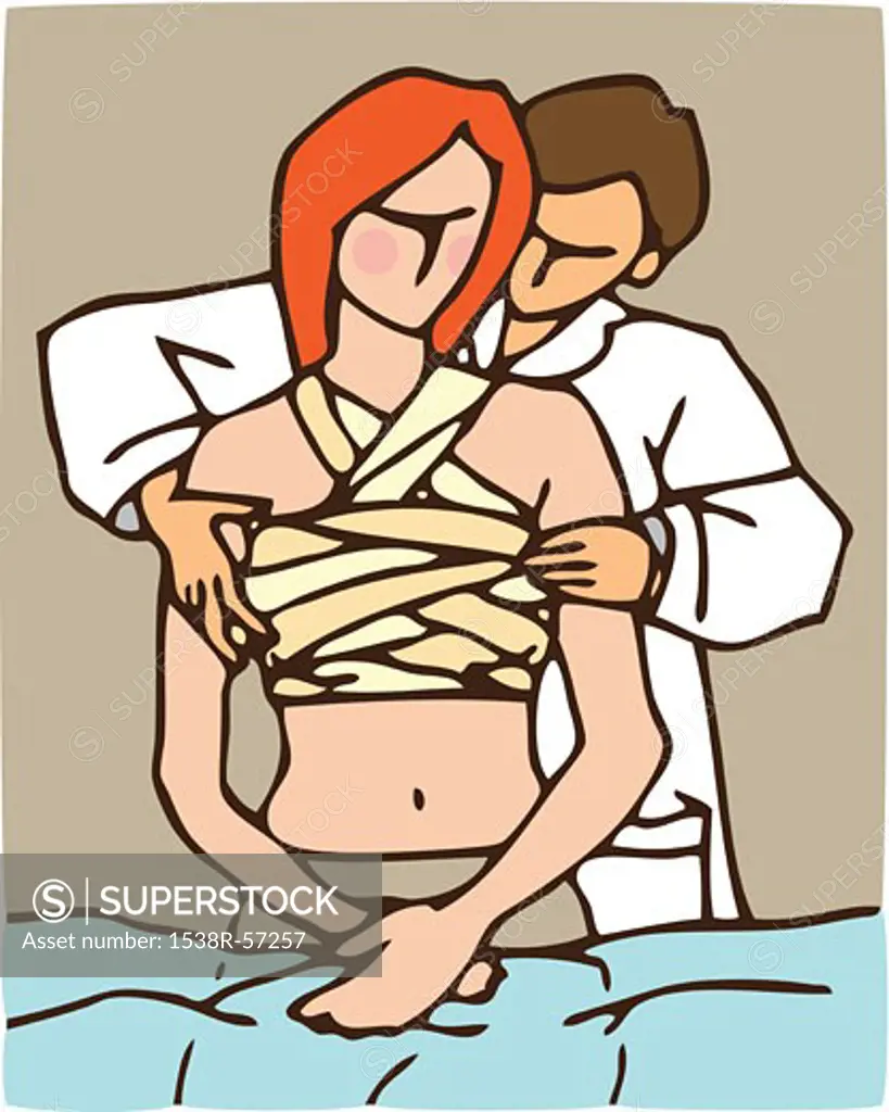 A doctor applying bandages to a female patients chest
