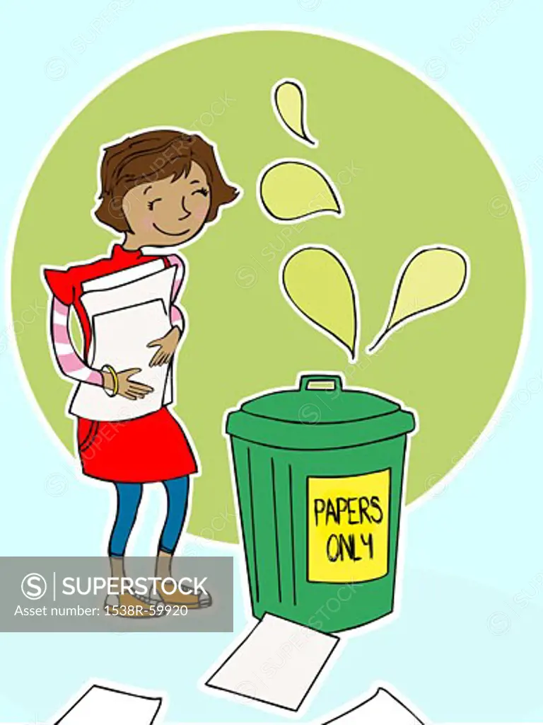 A girl taking a pile of papers to a recycling bin