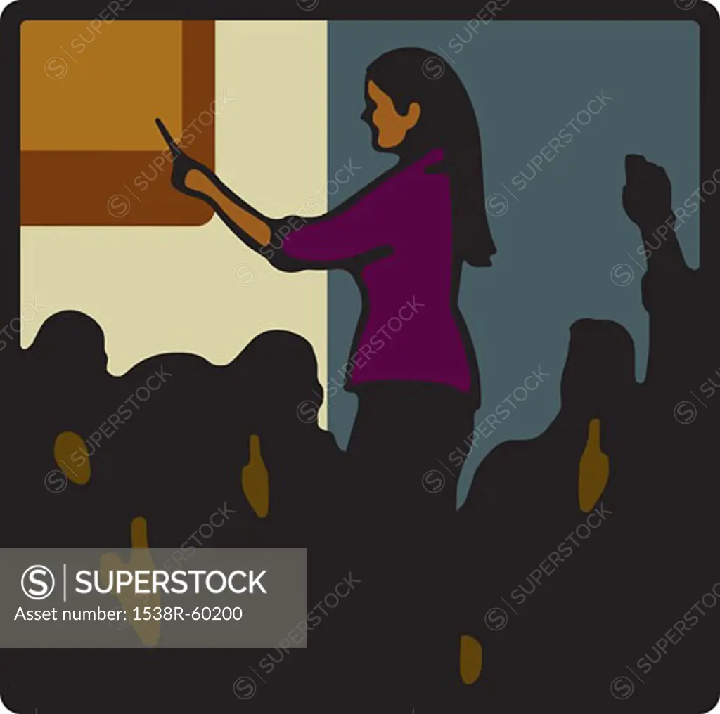 A woman pointing at a board in front of a crowd