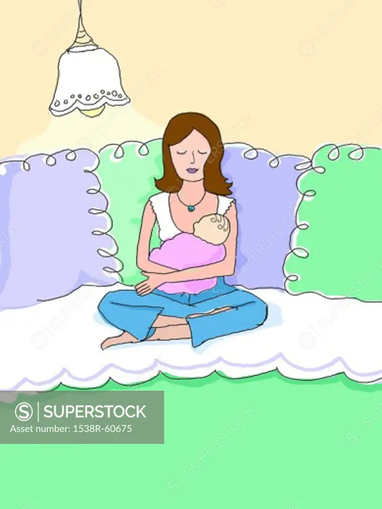 woman breast feeding her baby
