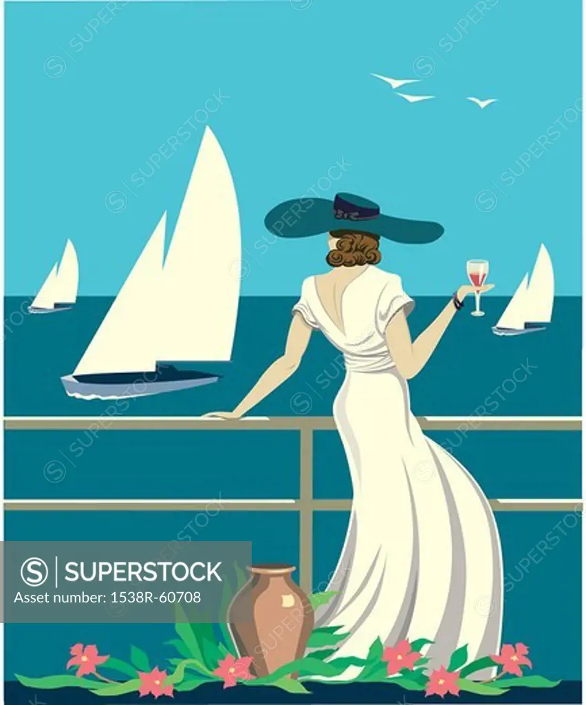 An elegant woman with fine wine looks out at the sea from the deck of her cruise ship