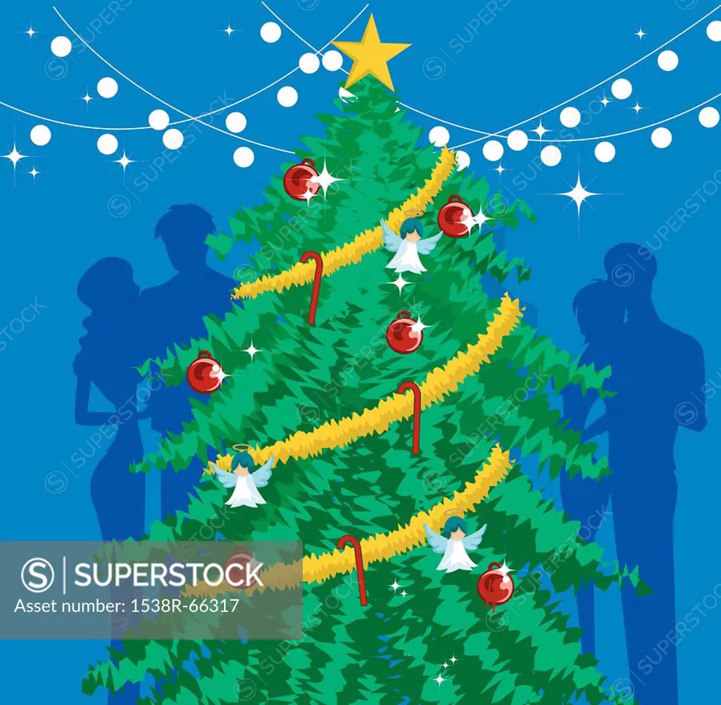 A decorated Christmas tree with silhouettes behind it