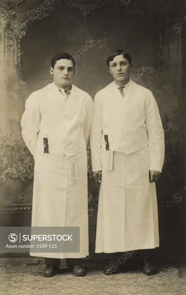 Portrait of two waiters standing, c.1908