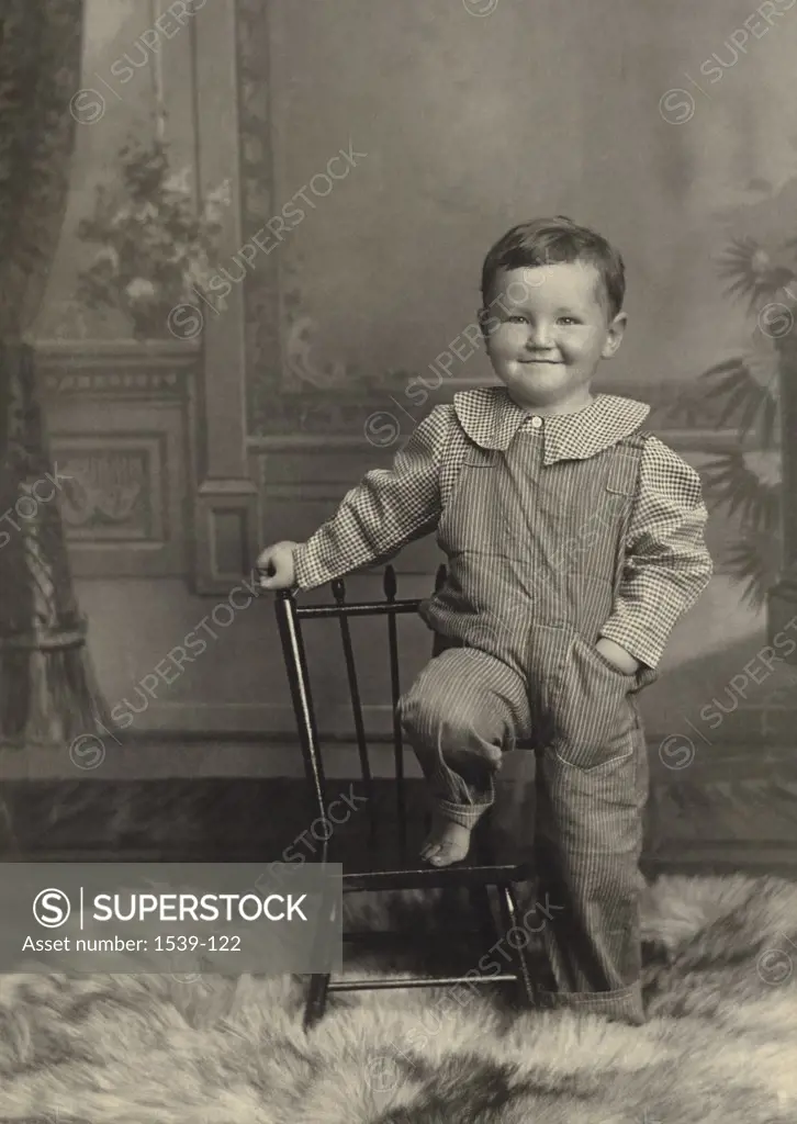 Portrait of a boy grinning, c. 1920
