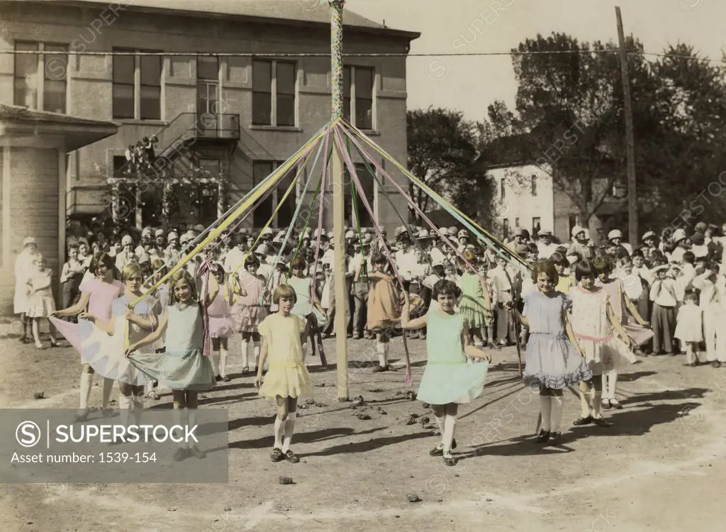 Girls dancing around a maypole, Pittsburg, Kansas, USA, 1928