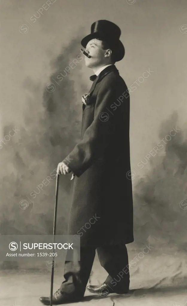 Side profile of a young man smoking, 1908