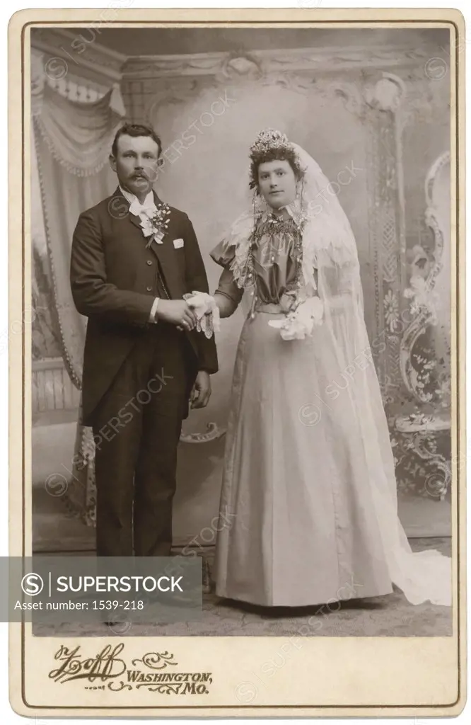 Groom holding his bride's hand, Washington, Missouri, USA, 1895