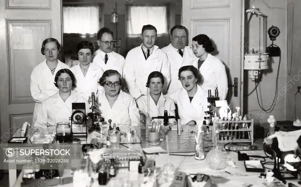 Estonian scientists in white coats in laboratory, ca. 1930