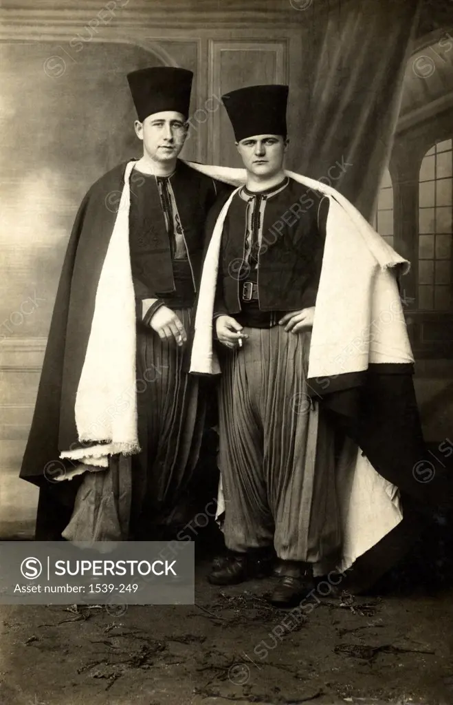 Two young men in traditional Turkish costume, Turkey, c.1925 - SuperStock