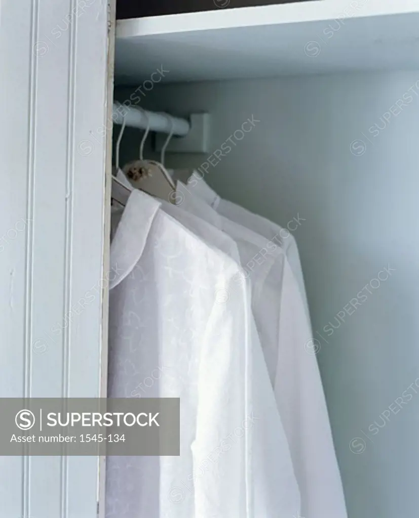 Shirts hanging in a closet