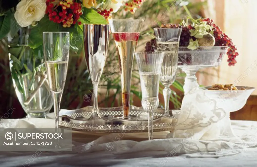 Close-up of wineglasses and fruit