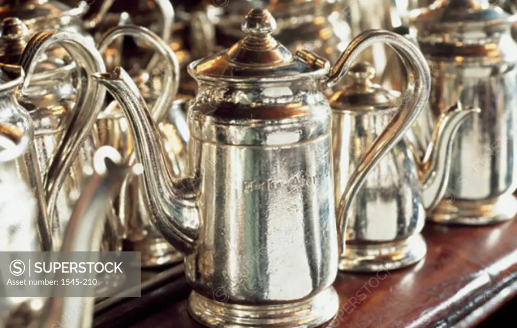 Close-up of kettles on a table