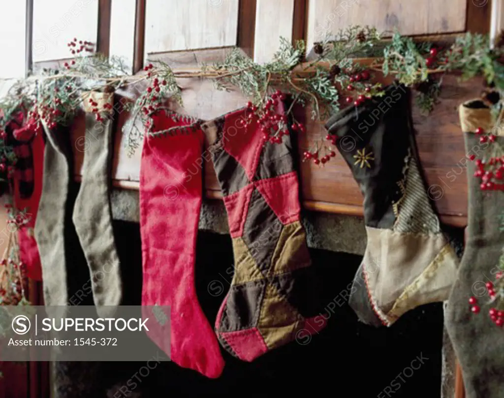 Close-up of Christmas stockings hanging on a mantelpiece