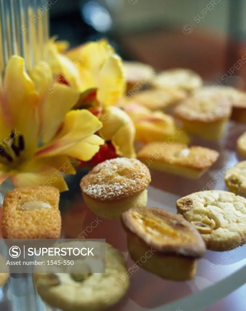 Close-up of assorted cookies with flowers