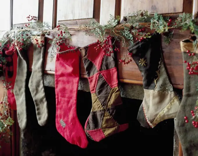 Close-up of Christmas stockings hanging on a mantelpiece