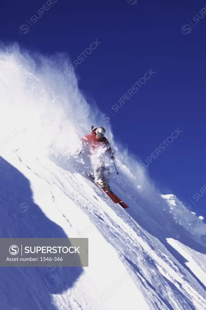 Low angle view of a woman skiing, Alpine Meadows, California, USA