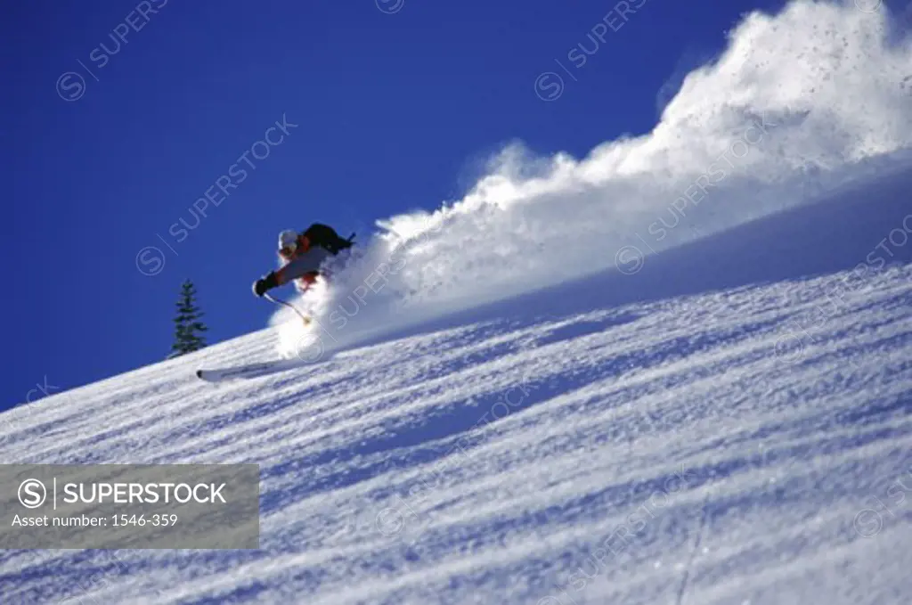 Low angle view of a man skiing, Brighton, Utah, USA