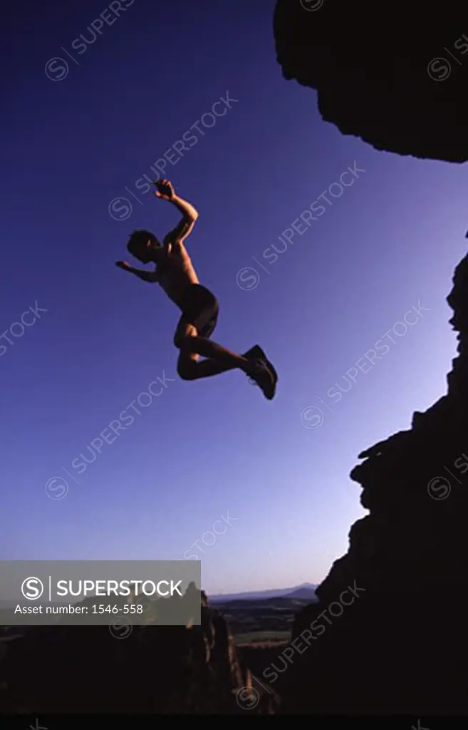 Low angle view of a man jumping