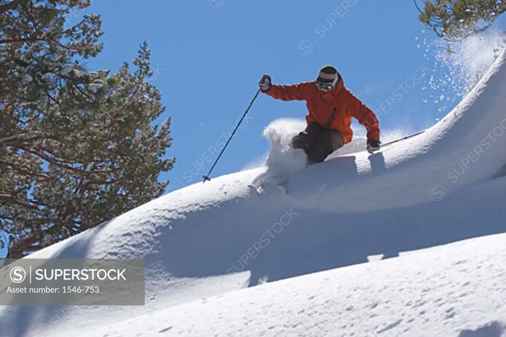 Low angle view of a man skiing on snow, Lake Tahoe, California, USA