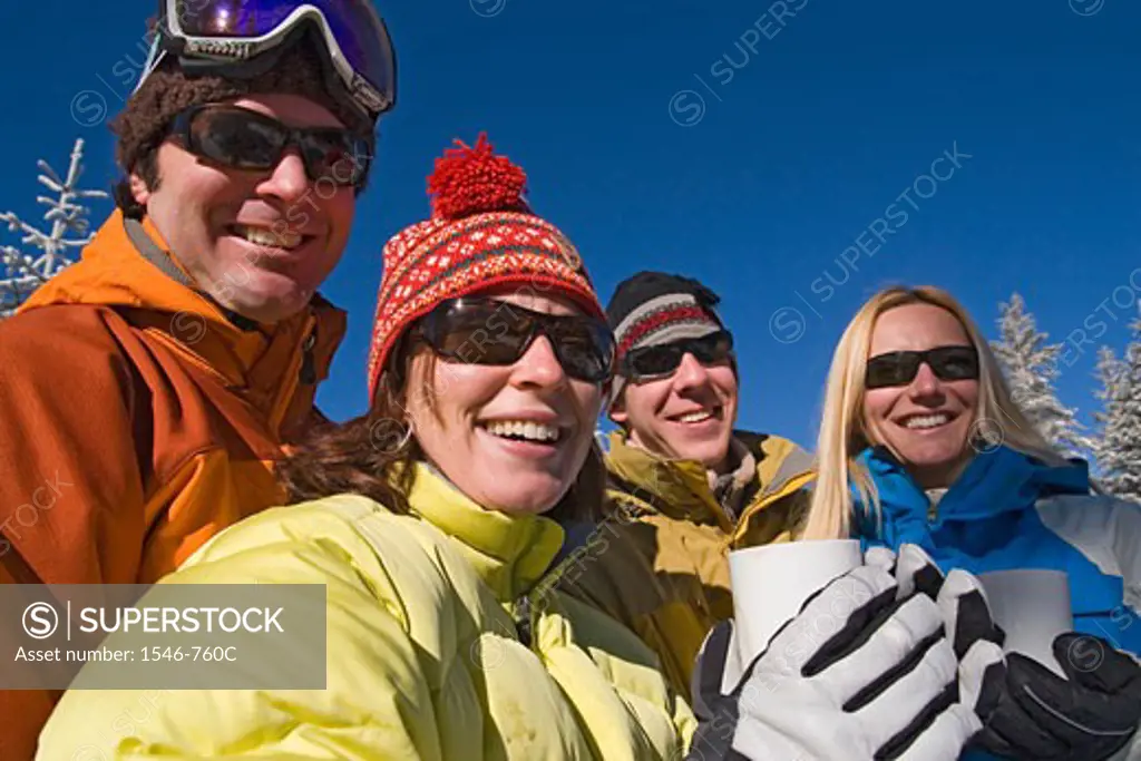 Two young couples smiling, Lake Tahoe, California, USA