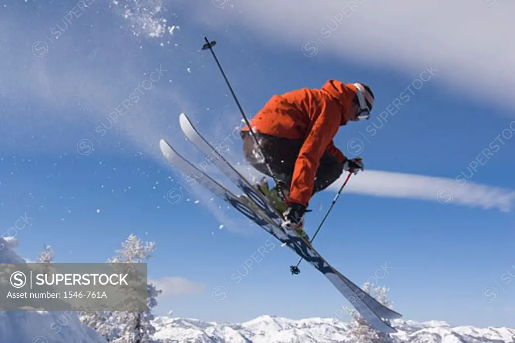Side profile of a man skiing on snow, Lake Tahoe, California, USA
