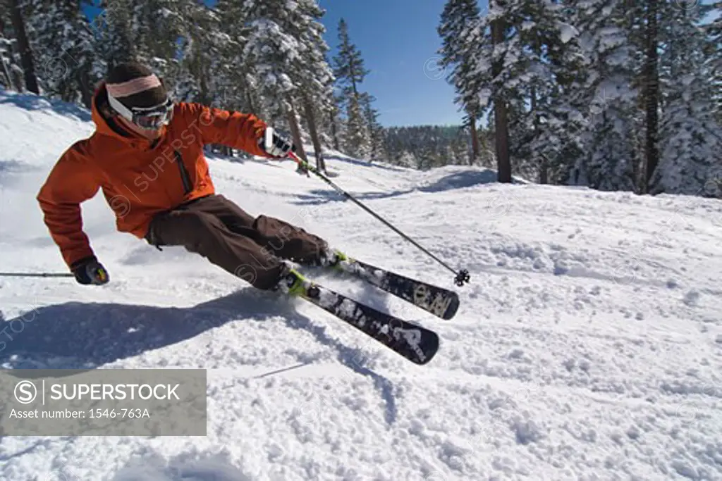 Man skiing on snow, Lake Tahoe, California, USA