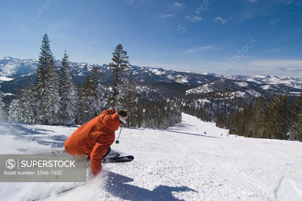 Rear view of a man skiing on snow, Lake Tahoe, California, USA