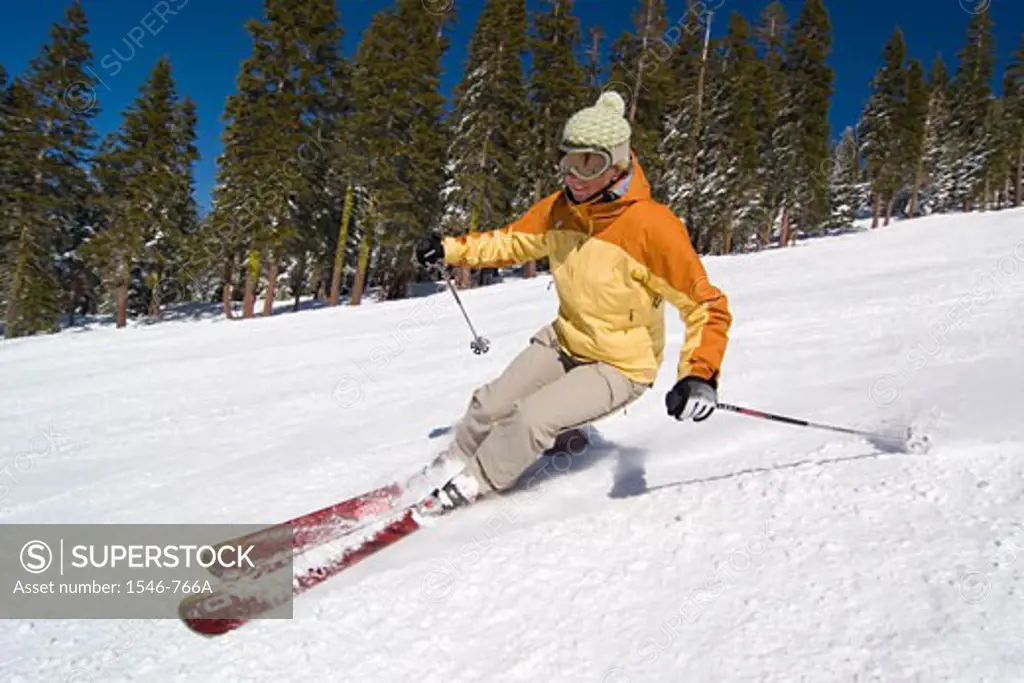 Woman skiing on snow, Lake Tahoe, California, USA