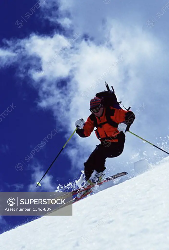 Man skiing on powder snow, Snowbird Ski Resort, Utah, USA