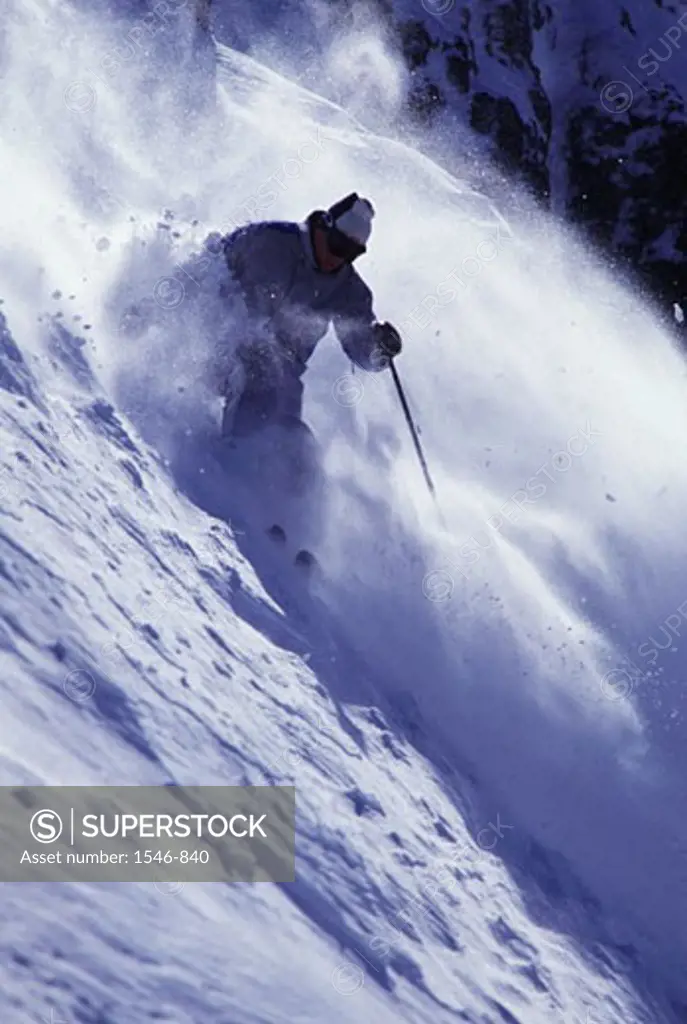 Low angle view of a man skiing on powder snow, Squaw Valley, Fresno County, California, USA