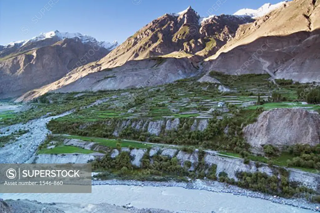 Terrace fields at the downside of a mountain range, Baltoro River, Karakoram Range, Baltistan, Pakistan