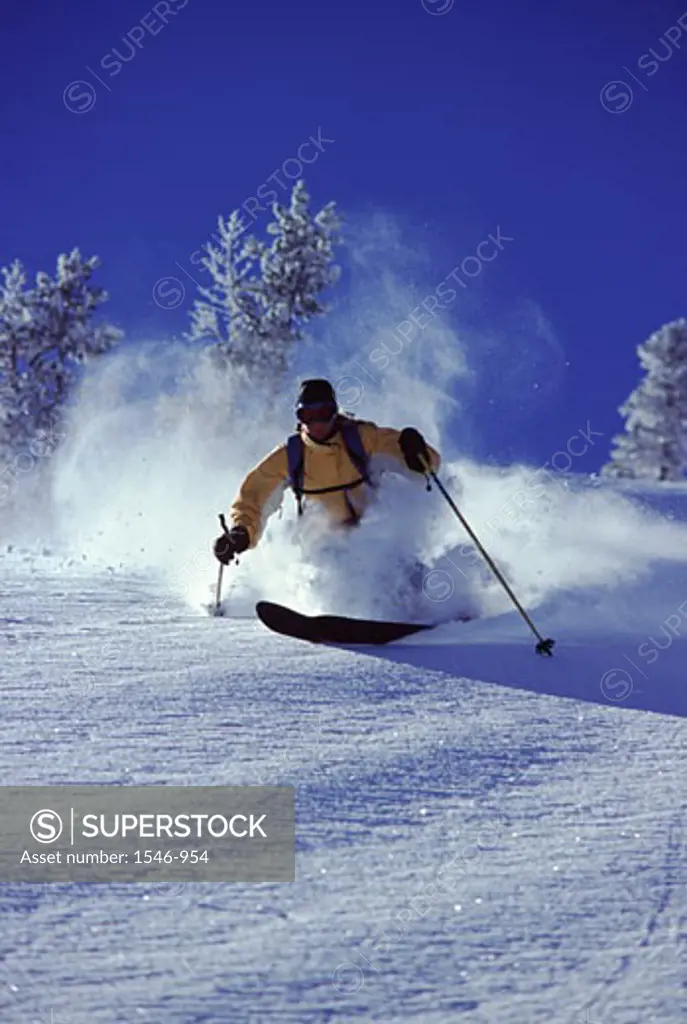 Woman skiing, Sugar Bowl Ski Resort, California, USA