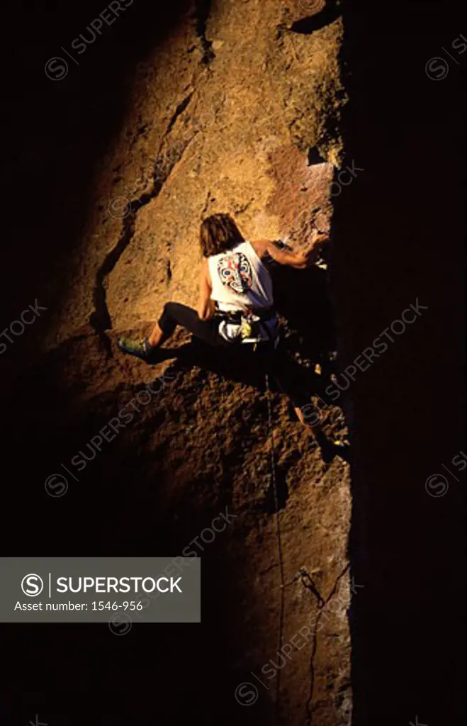 Man climbing a rock, Smith Rock, Oregon, USA