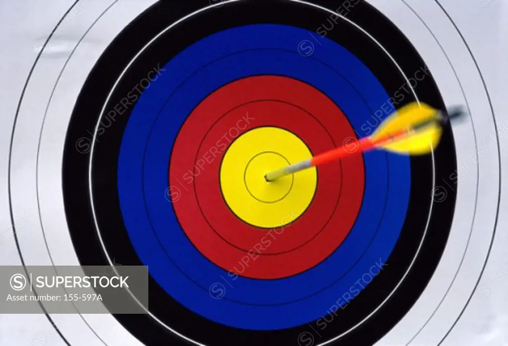 Close-up of a dart in bull's-eye