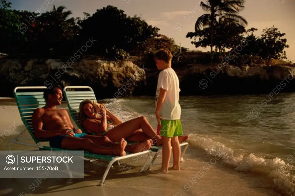 Mid adult couple on the beach with their son, Curacao, Netherlands Antilles
