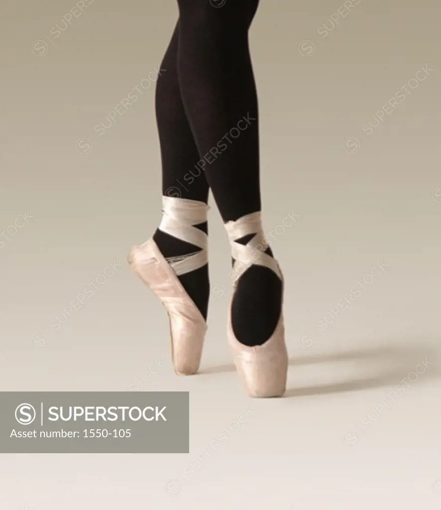 Low section view of a ballerina tiptoeing