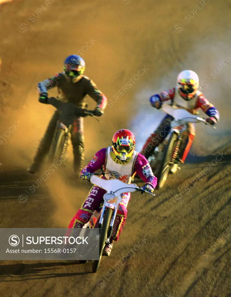 Motorcross racing on dirt track