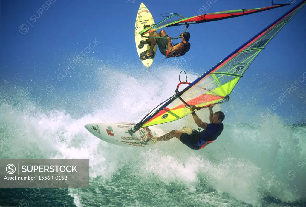 Two men windsurfing, Hawaii, USA