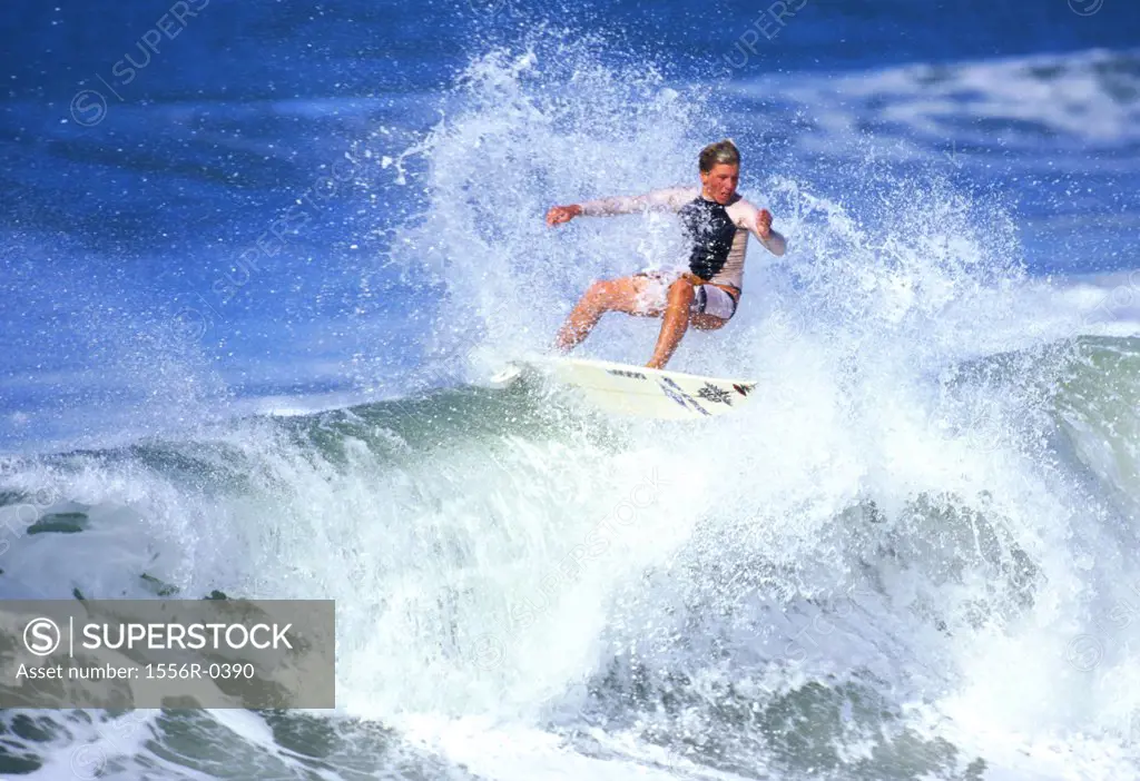 Teenage boy surfing, Durban, South Africa