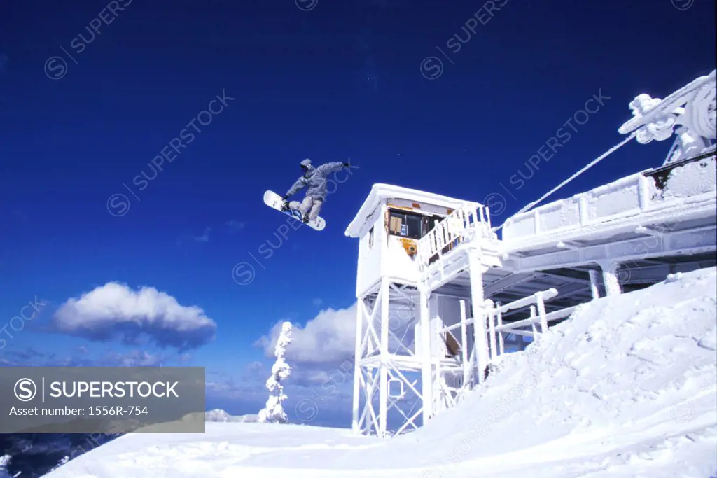Low angle view of a person snowboarding