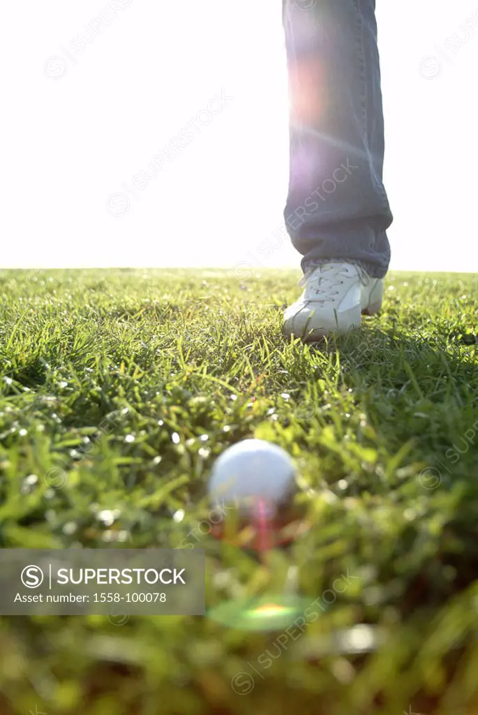 Golf course, man, detail, standing,  Leg, ball, back light,   Golfers, leisure time, Lifestyle, sport, hobby, sport, lawn sport, golf sport, gulves, p...