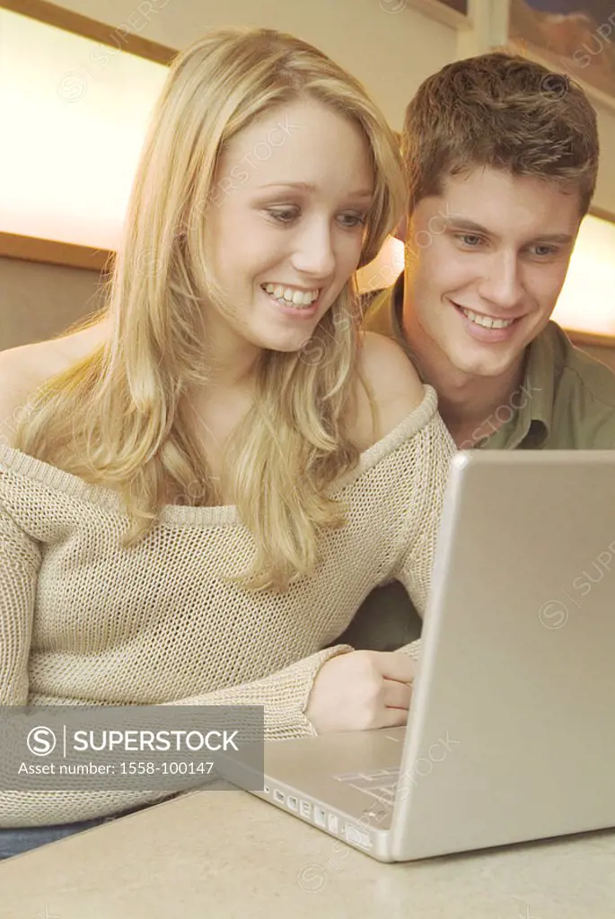 couple, young, smiling, laptop, cafe, sitting,  Half portrait,   Series, 20-30 years, leisure time, Lifestyle, pub, reading indoors, computers, writes...