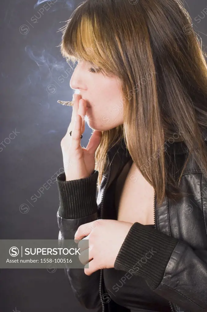 Woman, young, dress, leather jacket, cigarette, smokes, side portrait, truncated,   Series, 20-30 years, brunette, long-haired, smoker, pleasure, gree...