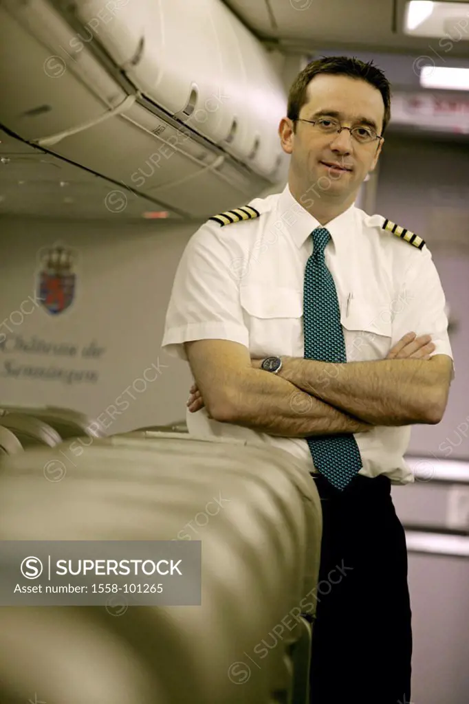 Passenger airplane, cubicle, pilot,  Look camera, detail,   Series, airplane, Boeing 737-700, pilots, man, stand, poor crossed, seriously, smiling, wo...