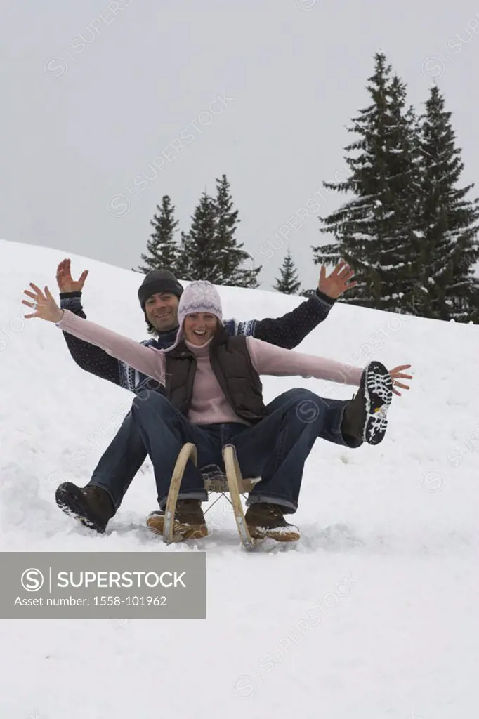 couple, sledding, cheerfully, winters,    Series, 20-30 years, sleighs, sitting, together, laughing, joy, omitted, sleighs, drives, fun, merrily, plea...
