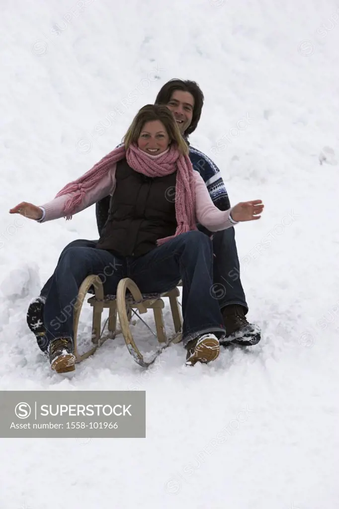 couple, sledding, cheerfully, winters,    Series, 20-30 years, sleighs, sitting, together, laughing, joy, omitted, sleighs, drives, fun, merrily, plea...